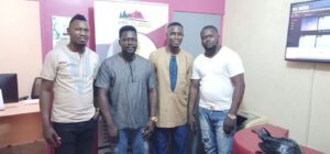 Dr. Alhaji K. Tarawally and Creative Team