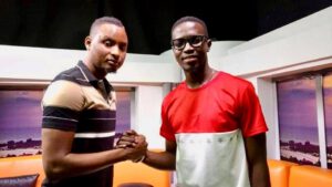 Dr. Alhaji K. Tarawally and K. Man